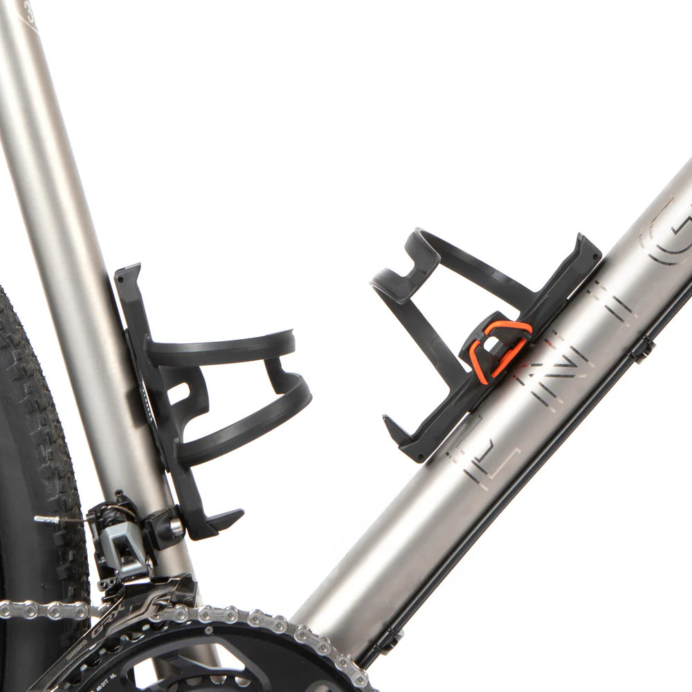 Close-up of a bicycle with two water bottle cages on a white background