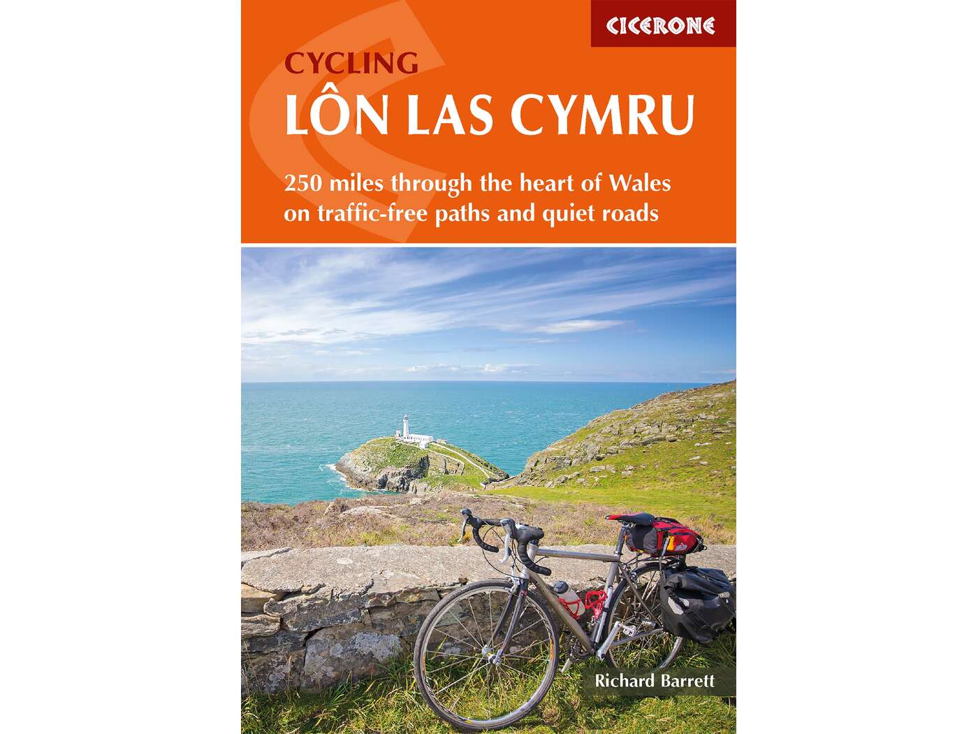 Front cover of Cycling Lon Las Cymru - bike pictured against a view of the sea