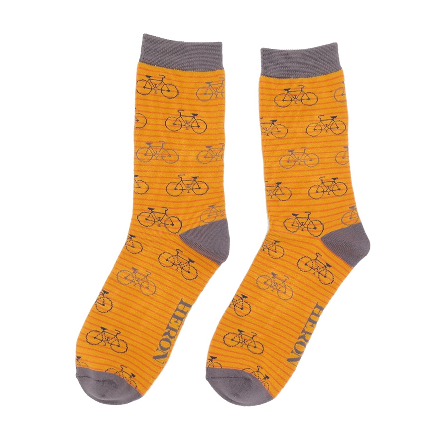 Mustard coloured socks with a stripes and bike pattern

