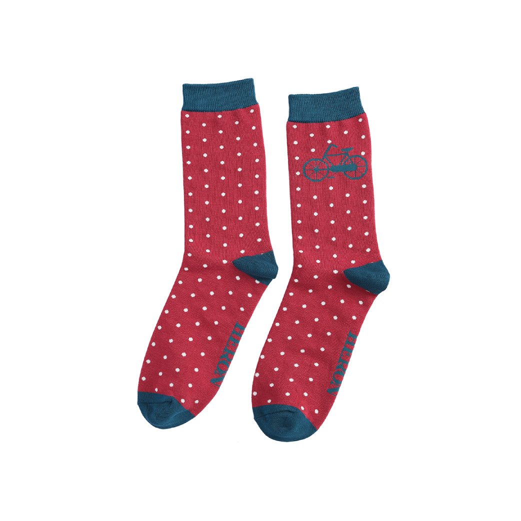 Deep red spots with white spots, navy blue bike and heel.